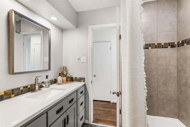 bathroom featuring vanity and shower / bathtub combination with curtain