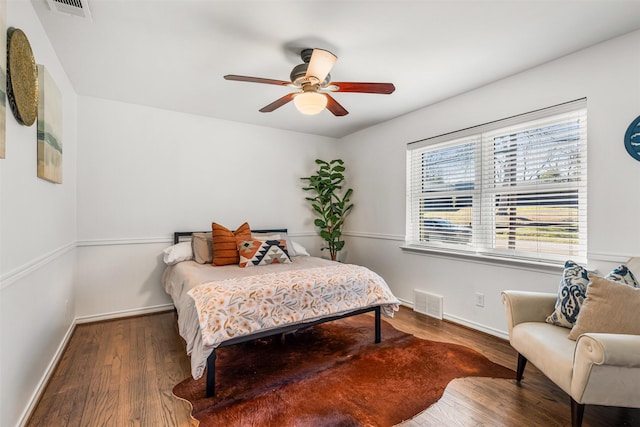 bedroom featuring ceiling fan and wood-type flooring