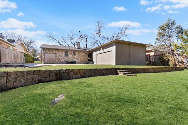 view of yard with a garage