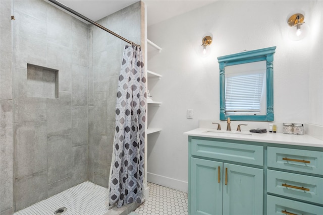 bathroom featuring vanity and curtained shower