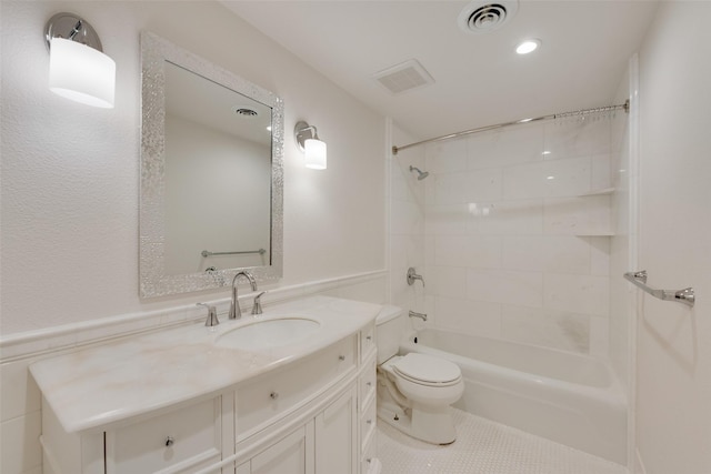 full bathroom featuring toilet, tile patterned flooring, shower / bath combination, and vanity