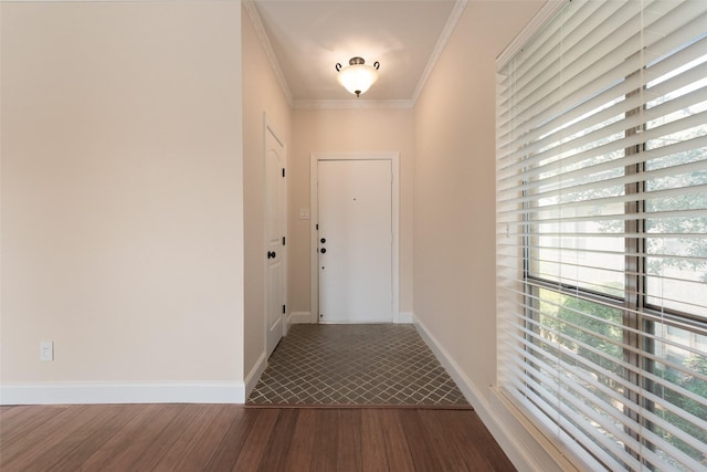 hallway featuring ornamental molding and hardwood / wood-style flooring