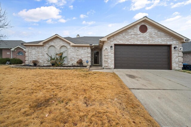 single story home featuring a garage