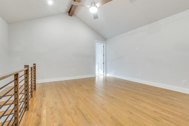 unfurnished room with ceiling fan, high vaulted ceiling, beam ceiling, and light wood-type flooring