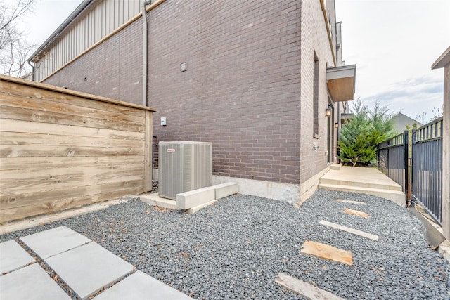 view of home's exterior with central air condition unit