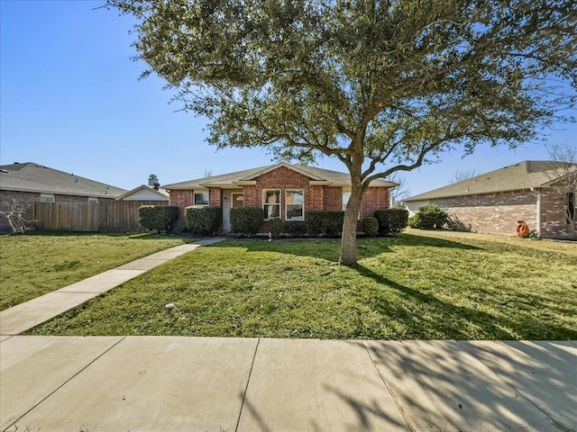 ranch-style home with a front yard