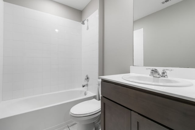 full bathroom featuring toilet, vanity, and shower / bathtub combination