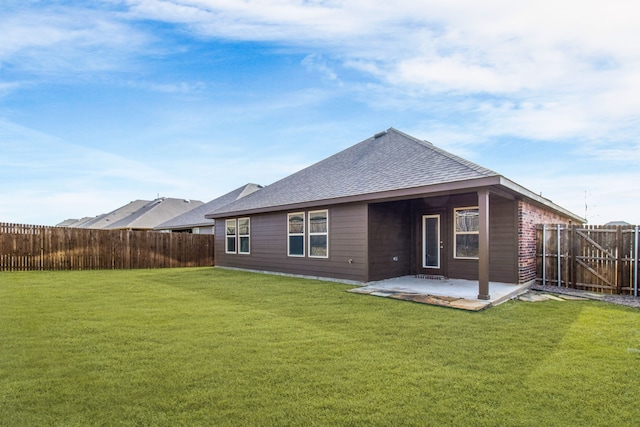 418 Rawhide Way, Princeton, TX 75407 - rear view of property with a patio and roof with shingles