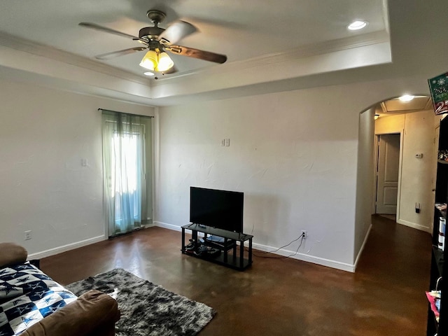 1358 Eastview St, Fort Worth, TX 76134 - living area with a raised ceiling, ornamental molding, a ceiling fan, and arched walkways