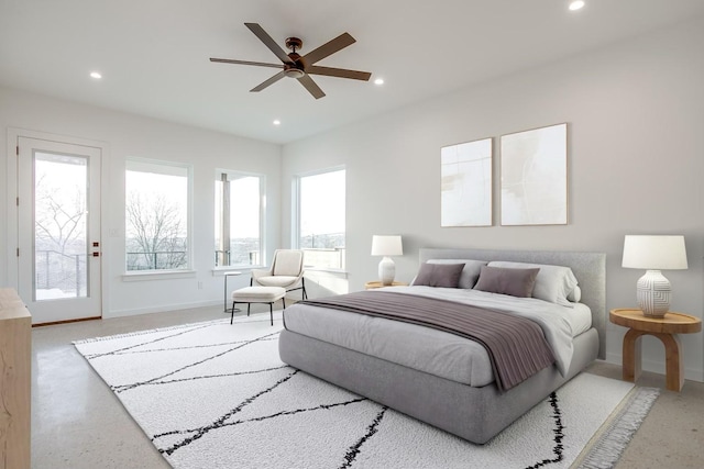 bedroom featuring access to exterior and ceiling fan