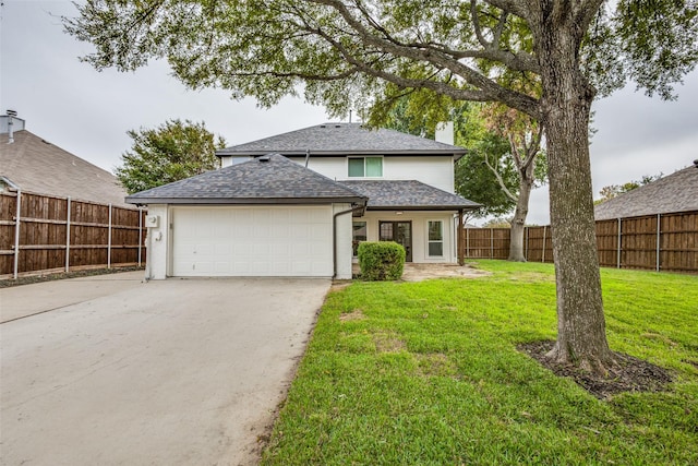 7800 Glenoaks Dr, Frisco, TX 75034 - view of front of house with a garage and a front lawn