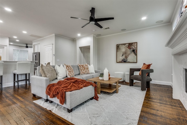 7800 Glenoaks Dr, Frisco, TX 75034 - living room featuring ceiling fan, ornamental molding, and wood-type flooring