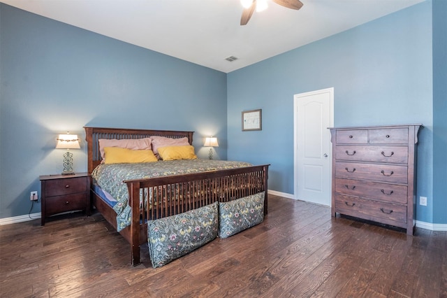 bedroom with ceiling fan and dark hardwood / wood-style flooring