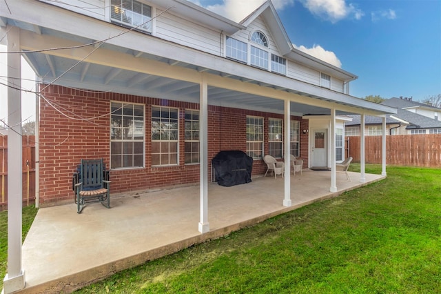 view of patio featuring a grill