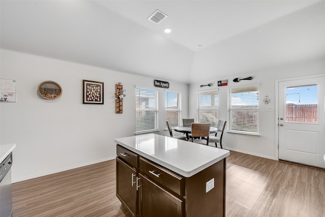 kitchen featuring light hardwood / wood-style floors, sink, stainless steel appliances, and ceiling fan