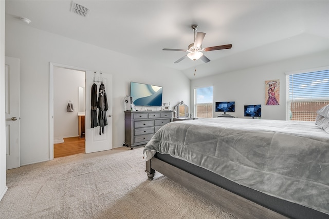 bedroom featuring ceiling fan and light carpet