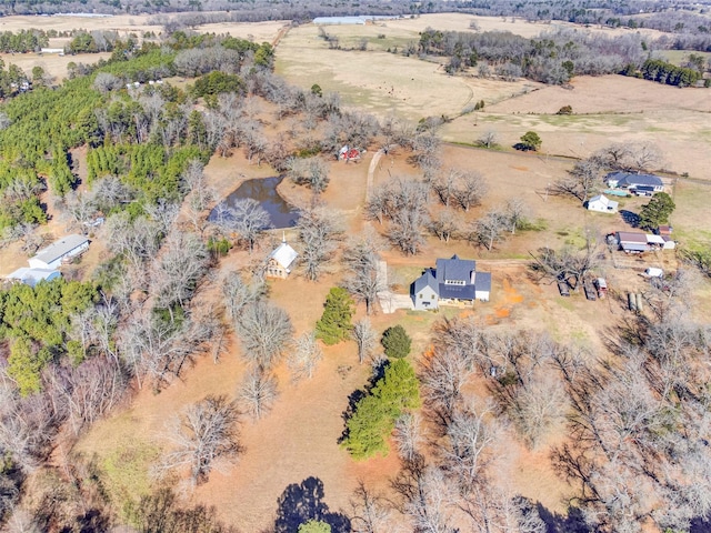 drone / aerial view with a rural view and a water view