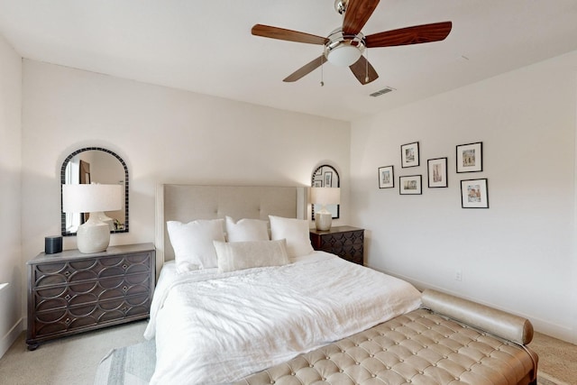 carpeted bedroom featuring ceiling fan