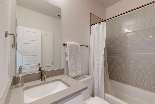 full bathroom with toilet, vanity, and shower / tub combo with curtain