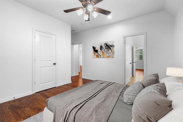 1333 Thornwood Dr, Murphy, TX 75094 - bedroom featuring baseboards, a ceiling fan, and wood finished floors