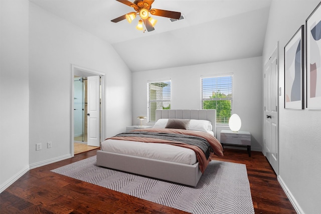 bedroom with baseboards, lofted ceiling, wood finished floors, and a ceiling fan