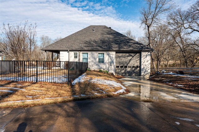 view of front of home featuring a garage