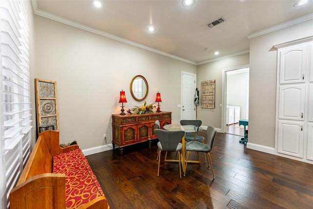 dining area with dark hardwood / wood-style flooring and ornamental molding