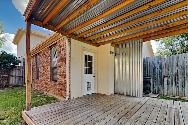 wooden deck with central air condition unit