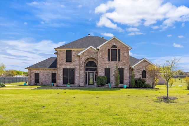 view of front of home featuring a front lawn