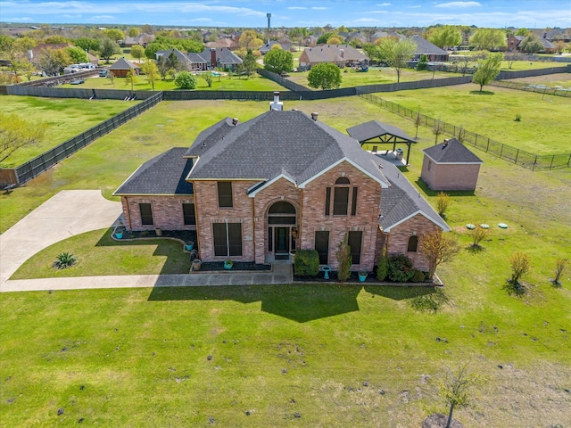 view of front of property with a front lawn