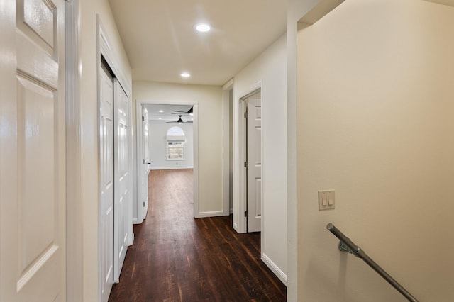 corridor with dark wood-type flooring