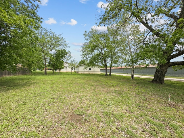 view of yard featuring fence