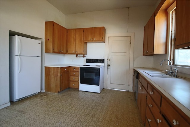 kitchen with white refrigerator, sink, dishwasher, and electric range oven