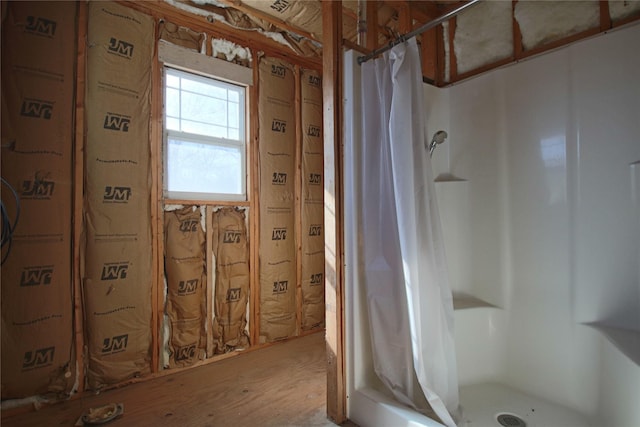 bathroom with curtained shower