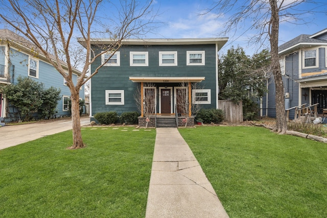 view of front of home with a front lawn