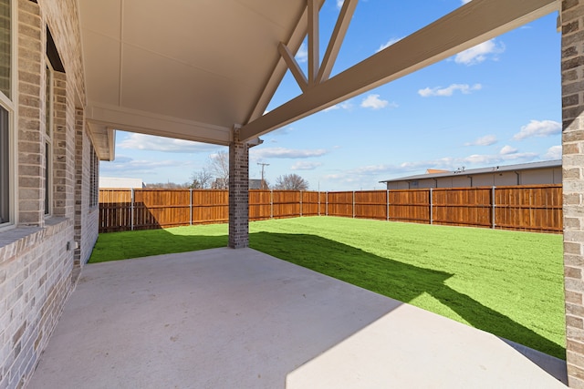 view of patio with a fenced backyard