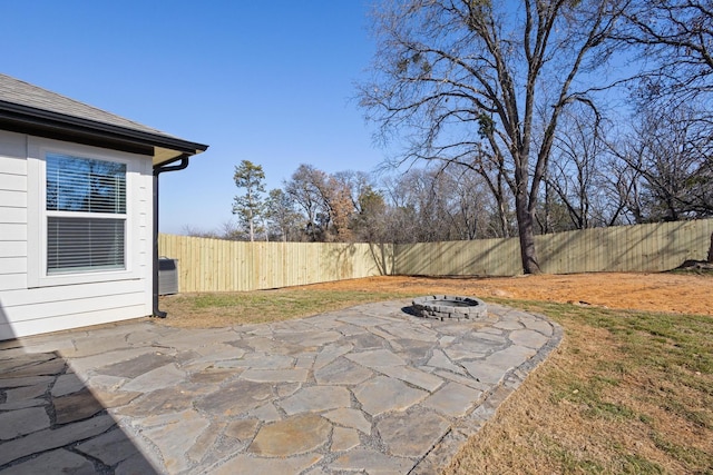 view of patio / terrace featuring a fire pit