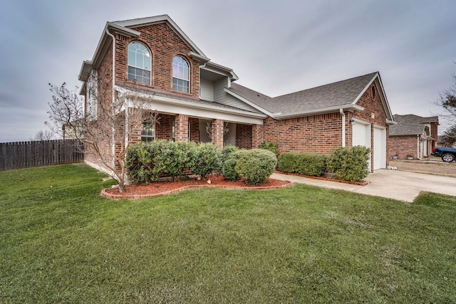 front of property featuring a garage and a front yard