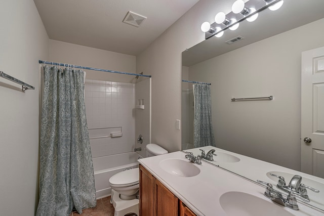 full bathroom featuring shower / bath combo with shower curtain, toilet, tile patterned flooring, and vanity