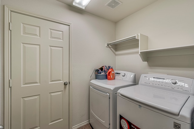 washroom featuring separate washer and dryer