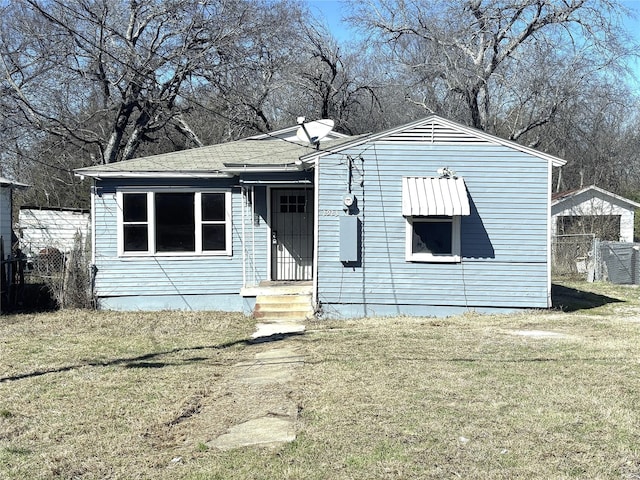 bungalow with a front lawn