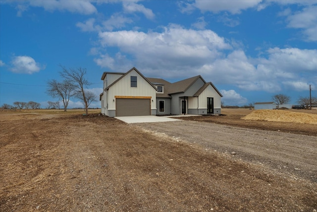 modern farmhouse with a garage