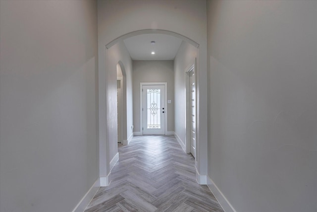 hallway featuring light parquet floors