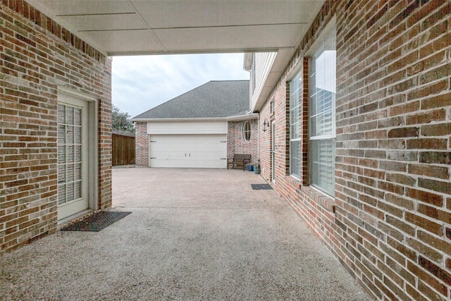 view of patio / terrace with a garage