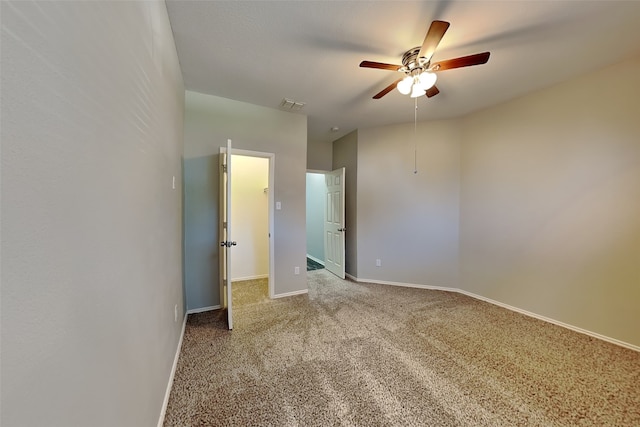 unfurnished bedroom featuring ceiling fan and carpet