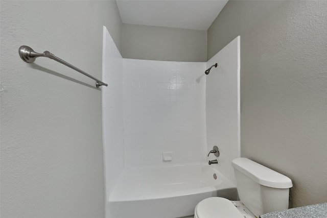 bathroom with toilet and shower / bathtub combination