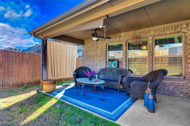 view of patio featuring ceiling fan