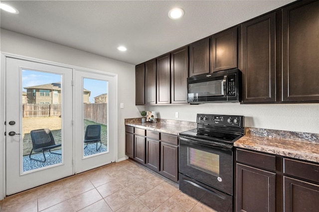 kitchen featuring recessed lighting, light tile patterned flooring, dark brown cabinetry, and black appliances