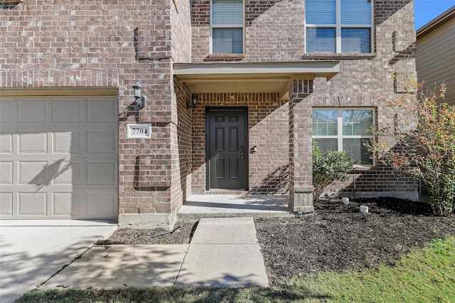 property entrance featuring a garage