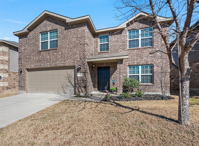 traditional home featuring driveway, brick siding, and an attached garage